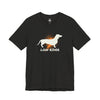 Black Heather t-shirt with a white dachshund silhouette, orange sunburst, and "Low Rider" graphic on the chest.