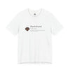 A white short-sleeve crewneck t-shirt featuring a printed dictionary-style definition of a Dachshund on the chest, complete with a small brown and black dog illustration.