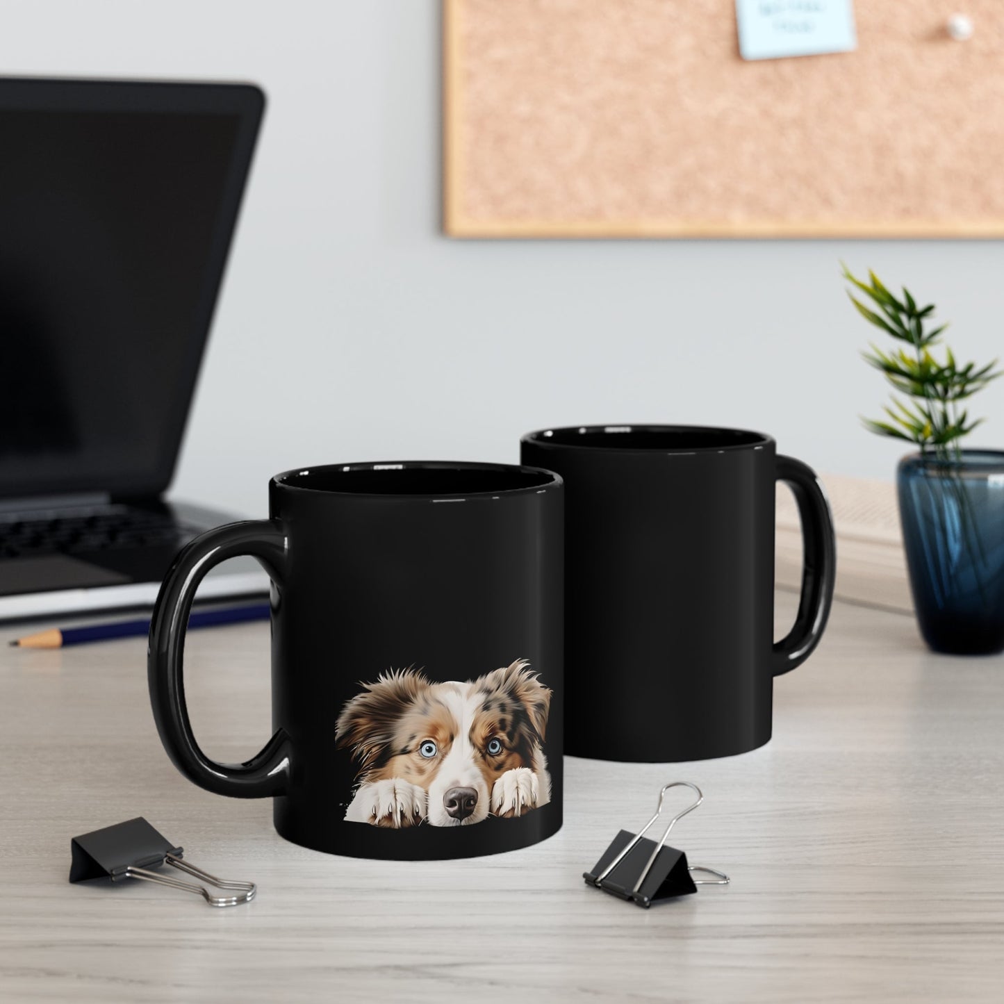 11 oz black ceramic dog mug with peeking Australian Shepherd design on office desk  with front and back view— perfect gift for dog mom, dog dad, or animal lovers.